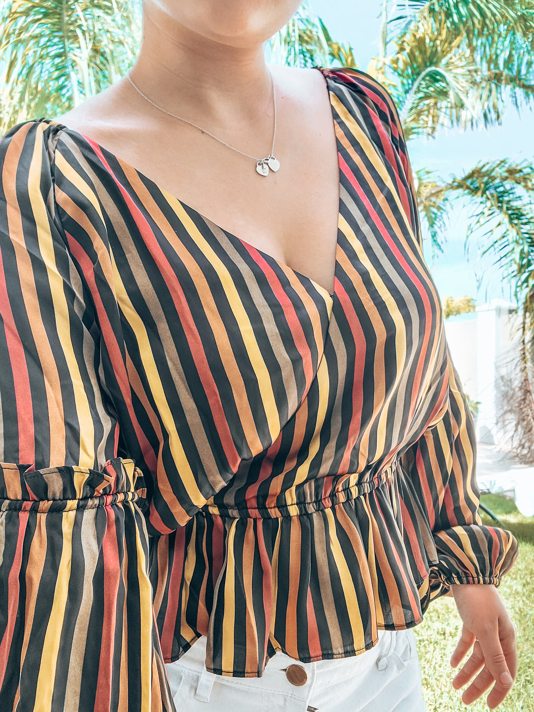 Lucía Peplum Top